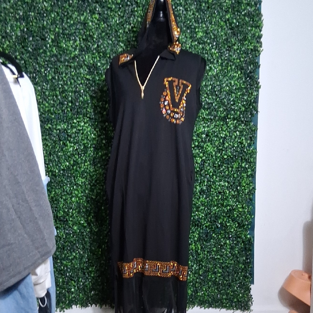 Elegant Black Sleeveless Dress with Gold Accents